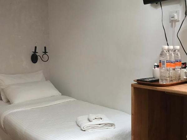 Lima.Tujoh : photo 2 de la chambre chambre quadruple