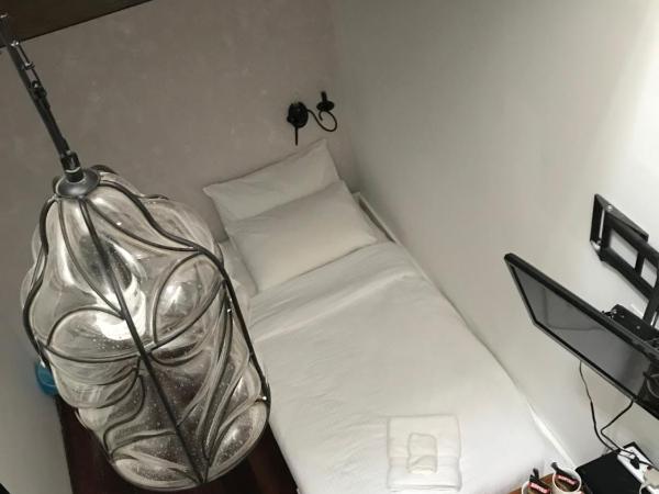 Lima.Tujoh : photo 6 de la chambre chambre quadruple