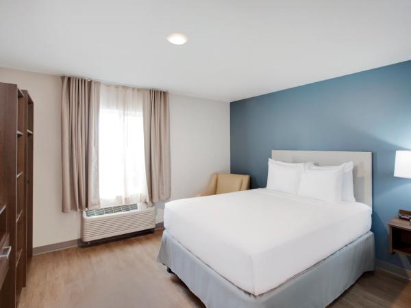 WoodSpring Suites Houston 288 South Medical Center : photo 7 de la chambre suite lit queen-size