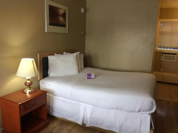 Nice Inn Edmonton : photo 10 de la chambre suite lit queen-size – non-fumeurs