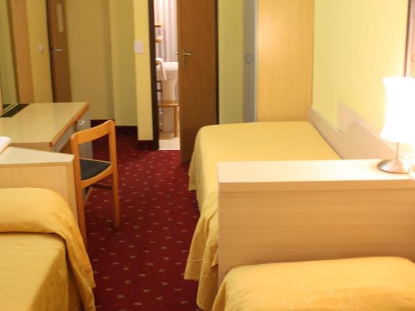 Hotel Lugano : photo 10 de la chambre chambre lits jumeaux