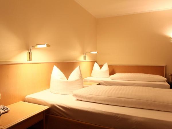 Hotel Ambiente Garni : photo 1 de la chambre chambre lits jumeaux