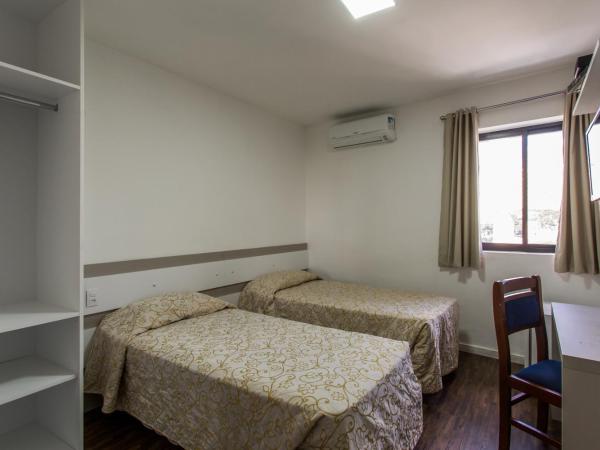 Cardim Plaza Hotel : photo 7 de la chambre chambre lits jumeaux standard