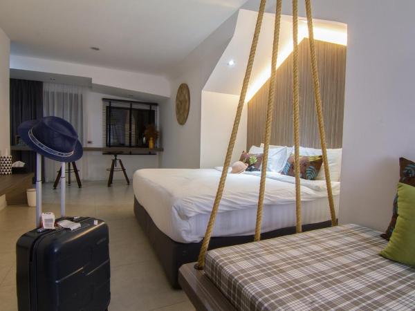 Bossotel Chiang Mai : photo 3 de la chambre chambre lit queen-size - vue sur jardin