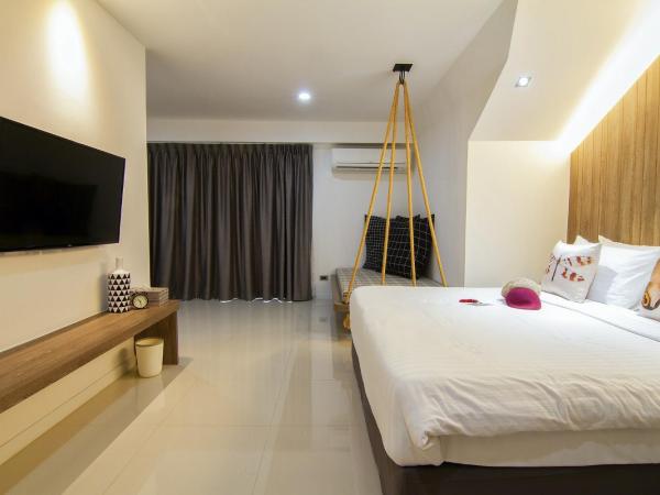 Bossotel Chiang Mai : photo 4 de la chambre chambre lit queen-size - vue sur jardin