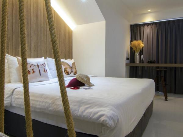 Bossotel Chiang Mai : photo 6 de la chambre chambre lit queen-size - vue sur jardin