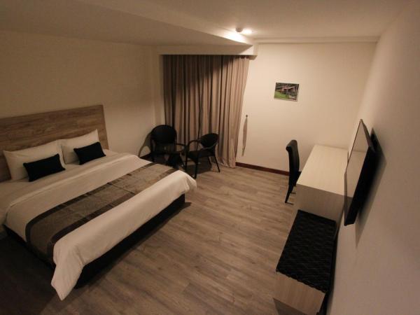 Molek Garden Hotel : photo 2 de la chambre chambre lit king-size deluxe