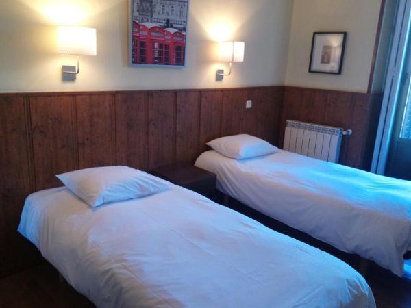 Hostal Asunción : photo 3 de la chambre chambre lits jumeaux