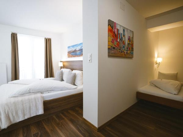 Hotel Römerhof : photo 1 de la chambre chambre triple