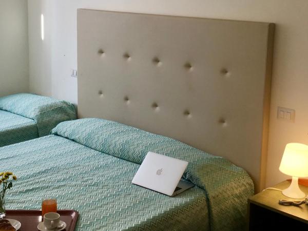 38 Aira Hotels : photo 1 de la chambre chambre triple