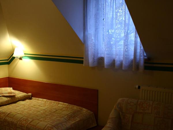 Amicus Żoliborz : photo 2 de la chambre petite chambre double