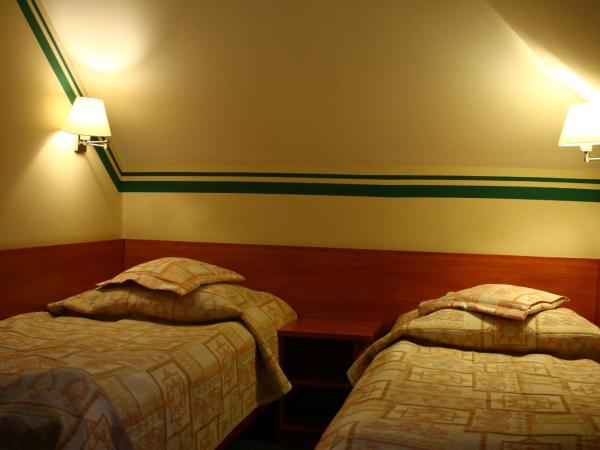 Amicus Żoliborz : photo 1 de la chambre petite chambre double