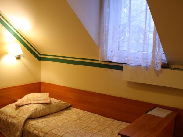 Amicus Żoliborz : photo 1 de la chambre petite chambre double
