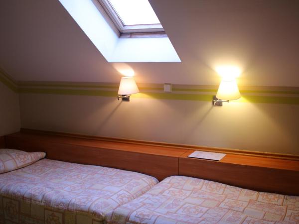Amicus Żoliborz : photo 3 de la chambre petite chambre double