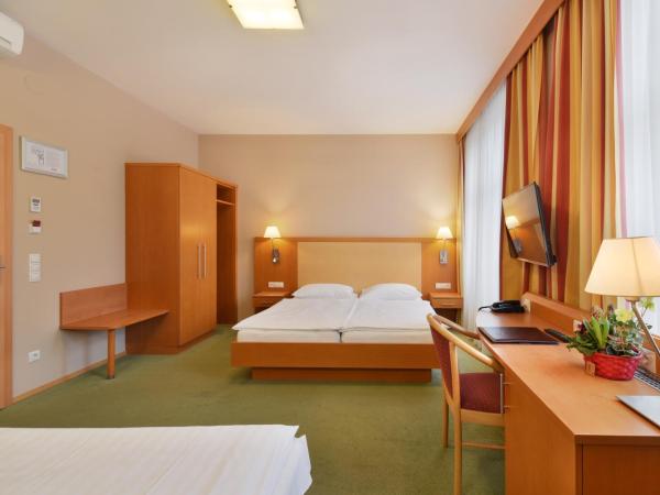 Hotel Lucia : photo 3 de la chambre chambre triple