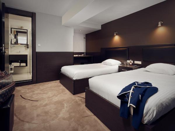 Belfort Hotel : photo 1 de la chambre chambre lits jumeaux sans fenêtre
