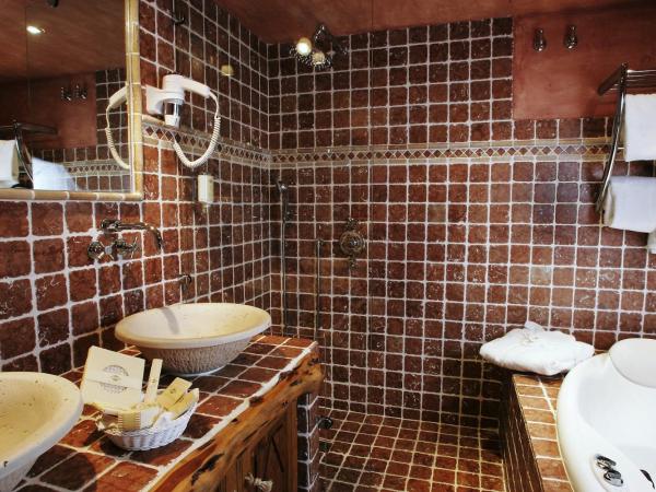Hôtel Le Belvédère : photo 5 de la chambre suite avec 2 bains à remous