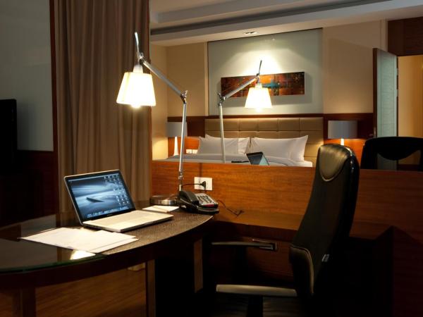 The Grand Fourwings Convention Hotel Bangkok : photo 5 de la chambre chambre deluxe double ou lits jumeaux