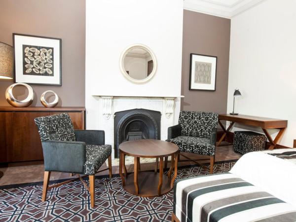 Avonmore On The Park Boutique Hotel : photo 2 de la chambre suite lit queen-size de luxe avec balcon