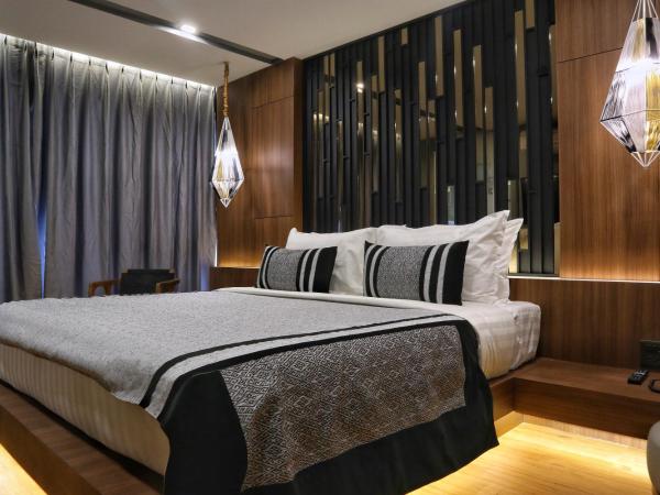 Stay with Nimman Chiang Mai - SHA Extra Plus : photo 6 de la chambre chambre lit king-size premier