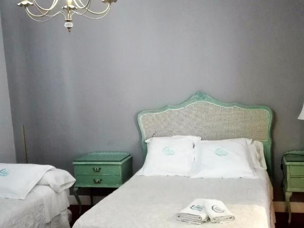 Le Petit Paris : photo 1 de la chambre chambre triple