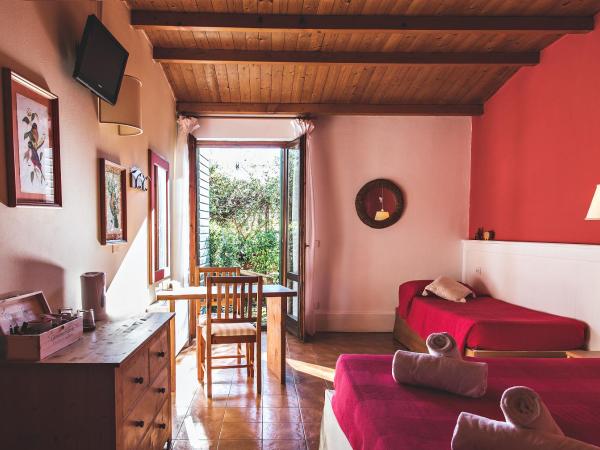 Corte San Mattia : photo 2 de la chambre chambre triple standard avec jardin privé