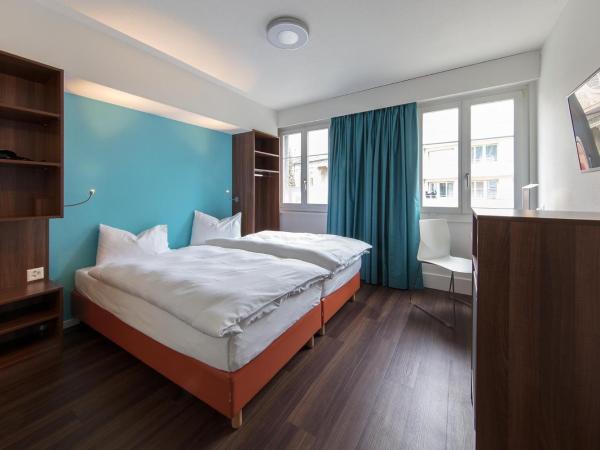 Royal Hotel Zurich : photo 2 de la chambre chambre lits jumeaux urbaine