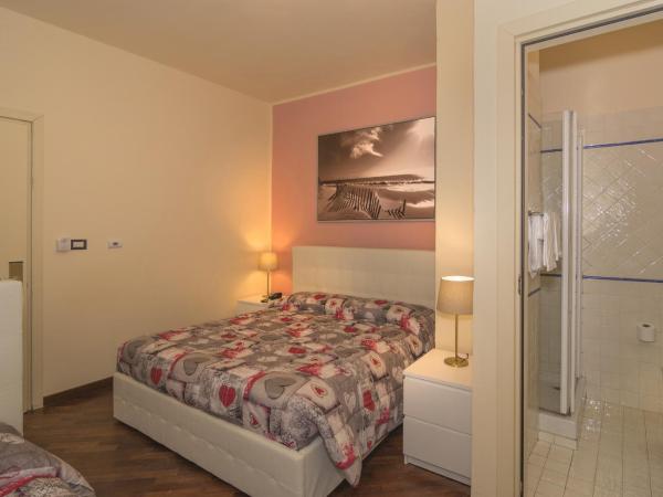 Hotel Il Giardino : photo 2 de la chambre chambre triple