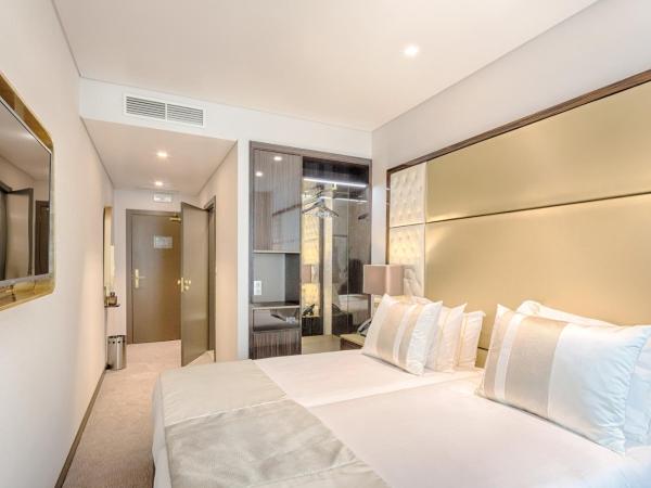 Hotel MeraPrime Gold Lisboa : photo 8 de la chambre chambre lits jumeaux standard