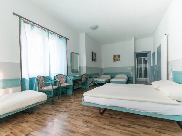 Hotel Besso Lugano Center : photo 1 de la chambre chambre familiale avec balcon