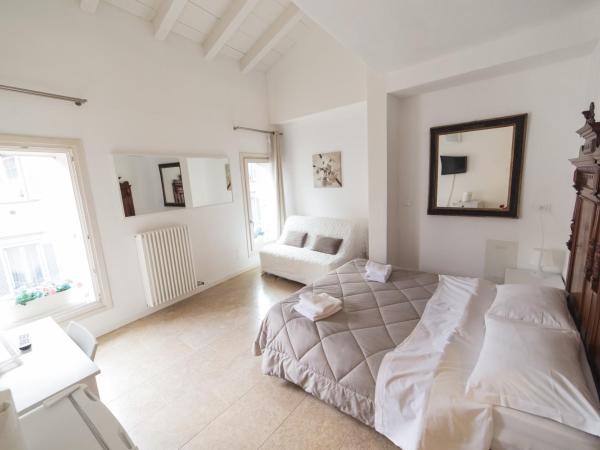 Academia Resort : photo 1 de la chambre chambre triple standard