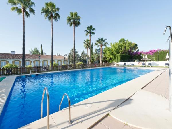 Exe Las Adelfas : photo 2 de la chambre chambre double - vue sur piscine