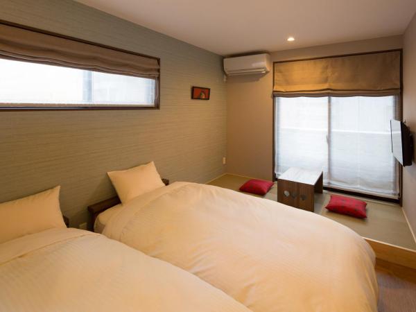 Yukari Kyoto : photo 1 de la chambre chambre lits jumeaux avec coin tatami et balcon