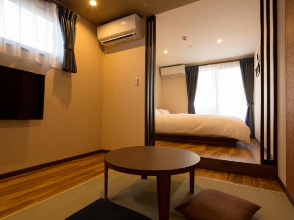 Yukari Kyoto : photo 2 de la chambre chambre lit queen-size avec coin tatami et balcon