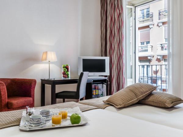 Exe Suites 33 : photo 2 de la chambre chambre triple