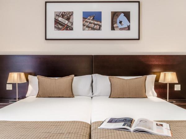 Exe Suites 33 : photo 1 de la chambre chambre triple