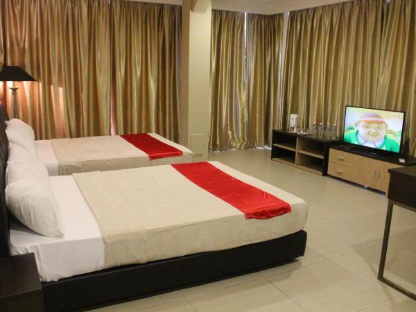 T Hotel Jalan Tar : photo 4 de la chambre chambre quadruple