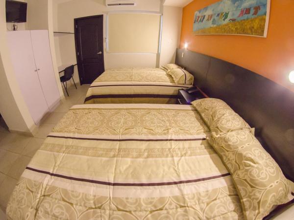 Hotel Belisario INN : photo 3 de la chambre chambre double avec 2 lits doubles