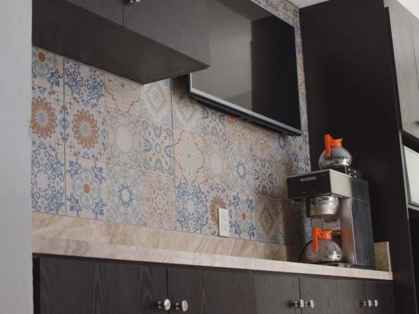 Hotel Belisario INN : photo 4 de la chambre chambre double avec 2 lits doubles