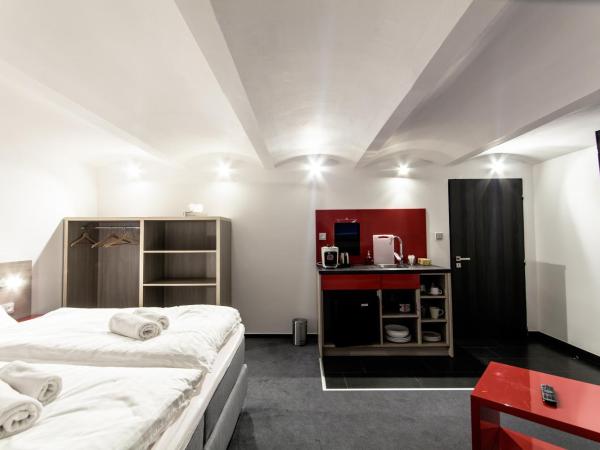 SILESIA Residence : photo 2 de la chambre studio lit king-size avec canapé-lit