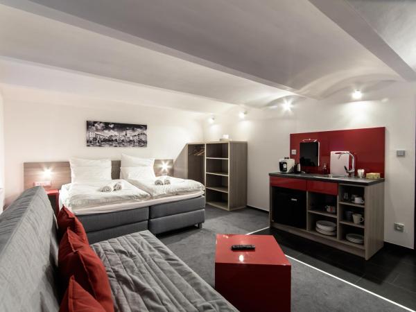 SILESIA Residence : photo 1 de la chambre studio lit king-size avec canapé-lit