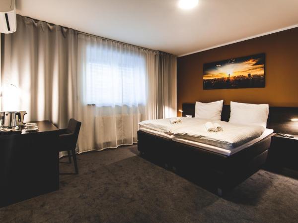 SILESIA Residence : photo 1 de la chambre chambre deluxe double ou lits jumeaux