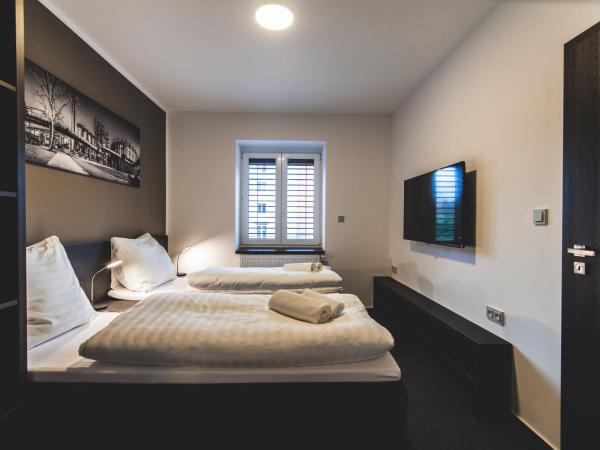 SILESIA Residence : photo 3 de la chambre chambre quadruple de luxe