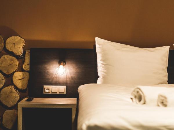 SILESIA Residence : photo 5 de la chambre chambre lit king-size