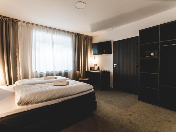 SILESIA Residence : photo 1 de la chambre chambre lit king-size