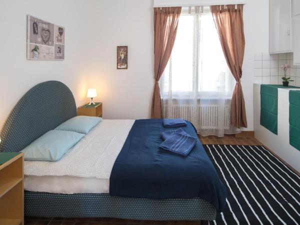 Rooms Al Festival : photo 1 de la chambre chambre lit queen-size avec salle de bains commune