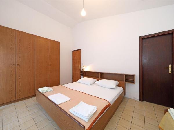 Rooms Jeriko : photo 4 de la chambre chambre triple standard – premier Étage