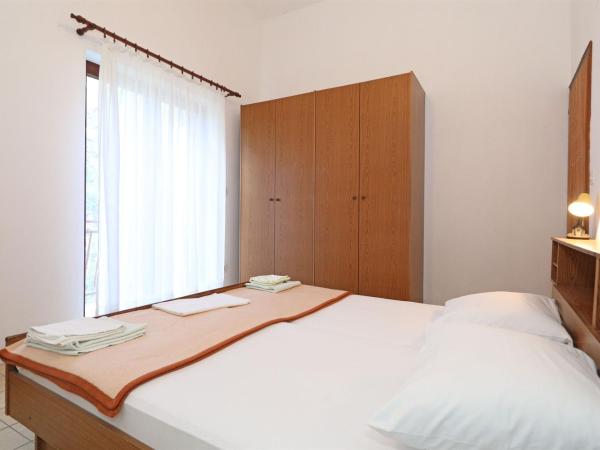 Rooms Jeriko : photo 5 de la chambre chambre triple standard – premier Étage