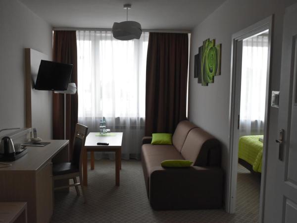 Hotel PZMot : photo 1 de la chambre studio lit king-size avec canapé-lit