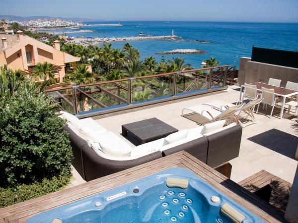 Gran Hotel Guadalpín Banus : photo 1 de la chambre suite junior deluxe avec terrasse et bain à remous - vue sur mer